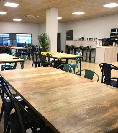 The La Halle bar with large wooden tables